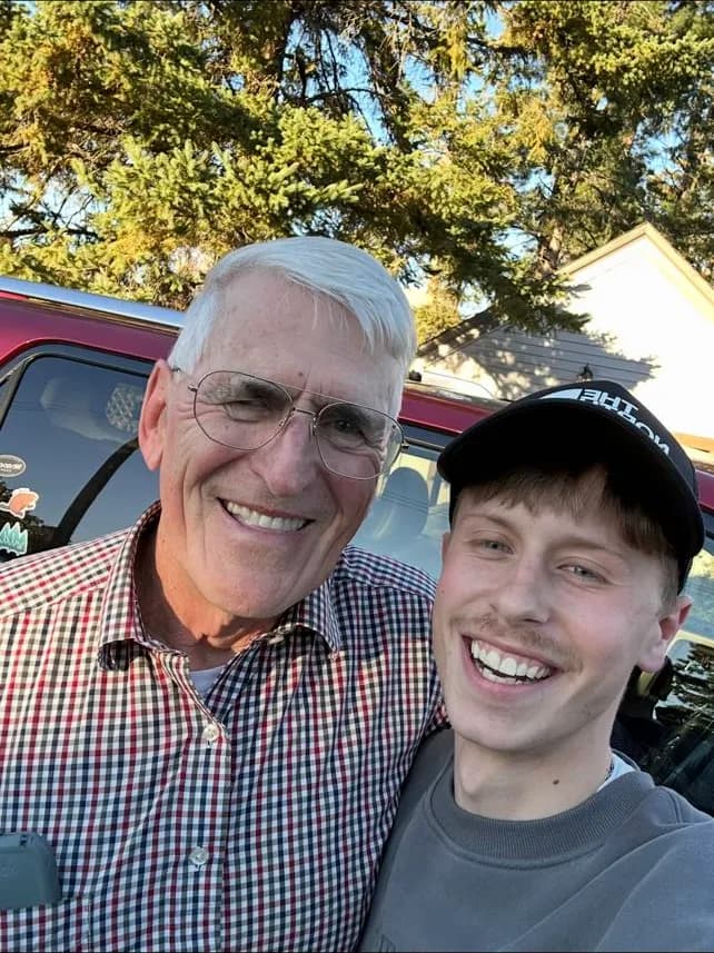 Logen Doiel with his mentor Dave Deda on a Wisconsin beach
